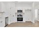 Bright kitchen features stainless steel appliances, white cabinetry, and modern design at 606 Meadow Ave, Spencer, NC 28159