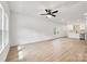 An open-concept living space with luxury vinyl plank flooring and abundant natural light at 606 Meadow Ave, Spencer, NC 28159