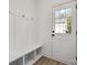 Mudroom with bench, storage, and a stylish doorway at 606 Meadow Ave, Spencer, NC 28159
