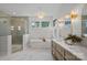 Luxurious bathroom with a soaking tub, double vanity, and walk in shower at 705 Mcalway Rd, Charlotte, NC 28211