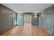 Spacious bedroom with hardwood floors and gray walls at 705 Mcalway Rd, Charlotte, NC 28211