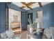 Bright home office featuring wood beams and French doors at 705 Mcalway Rd, Charlotte, NC 28211