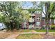 Brick townhome with landscaping and walkway at 1506 Kenilworth Ave, Charlotte, NC 28203