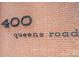 Building address, 400 Queens Road, displayed on brick at 400 Queens Rd # E5, Charlotte, NC 28207