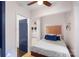 Cozy bedroom with a double bed, walk-in closet, and ceiling fan at 400 Queens Rd # E5, Charlotte, NC 28207