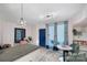 Charming dining area with a round table and view of the kitchen at 400 Queens Rd # E5, Charlotte, NC 28207