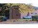 Brick building exterior, showcasing landscaping and parking at 400 Queens Rd # E5, Charlotte, NC 28207