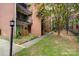 Brick building exterior with landscaping and walkway at 400 Queens Rd # E5, Charlotte, NC 28207