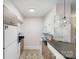 Modern kitchen with wood cabinets, stainless steel appliances, and granite countertops at 400 Queens Rd # E5, Charlotte, NC 28207