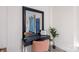 Home office with a desk and mirror reflecting the entryway at 400 Queens Rd # E5, Charlotte, NC 28207