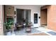 Cozy patio with seating area, fire pit, and potted plants at 400 Queens Rd # E5, Charlotte, NC 28207