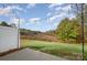 Private backyard with patio and scenic view at 105 Beverly Chase Ln, Mooresville, NC 28117