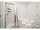 Bathroom featuring a shower and bathtub at 105 Beverly Chase Ln, Mooresville, NC 28117