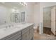 Bathroom features double vanity, garden tub, and walk-in shower at 105 Beverly Chase Ln, Mooresville, NC 28117