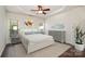 Spacious bedroom with hardwood floors and ceiling fan at 105 Beverly Chase Ln, Mooresville, NC 28117