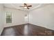 Spacious bedroom with hardwood floors and ceiling fan at 105 Beverly Chase Ln, Mooresville, NC 28117