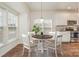 Bright kitchen with stainless steel appliances and white cabinets at 105 Beverly Chase Ln, Mooresville, NC 28117