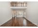 Spacious living room with hardwood floors, high ceilings, and a loft view at 105 Beverly Chase Ln, Mooresville, NC 28117