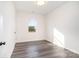 Bright bedroom with wood-look floors and a window offering a view at 1244 Bob Falls Rd, Shelby, NC 28150