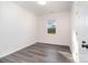 Simple bedroom with wood-look floors and window at 1244 Bob Falls Rd, Shelby, NC 28150