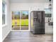 Kitchen with stainless steel appliances and sliding glass door to patio at 1244 Bob Falls Rd, Shelby, NC 28150