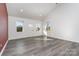 Bright living room with hardwood floors and vaulted ceiling at 1244 Bob Falls Rd, Shelby, NC 28150