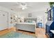 Main bedroom with king-size bed, hardwood floors, and ensuite bathroom at 191 Oak Village Pkwy, Mooresville, NC 28117