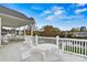 Community deck overlooking a pond with seating at 191 Oak Village Pkwy, Mooresville, NC 28117