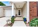 Inviting entryway with walkway, door and potted plants at 191 Oak Village Pkwy, Mooresville, NC 28117