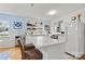 Bright kitchen with white cabinets, island, and stainless steel appliances at 191 Oak Village Pkwy, Mooresville, NC 28117