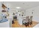 Modern white kitchen with stainless steel appliances and island at 191 Oak Village Pkwy, Mooresville, NC 28117