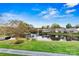 Scenic pond with walking path and gazebo at 191 Oak Village Pkwy, Mooresville, NC 28117