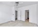 Well-lit bedroom with carpet and ceiling fan at 2030 Cambridge Beltway Dr, Charlotte, NC 28273