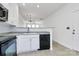 Modern kitchen with stainless steel appliances and white cabinets at 2030 Cambridge Beltway Dr, Charlotte, NC 28273