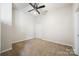 Bright bedroom with neutral walls and carpet flooring at 2125 Southend Dr # 349, Charlotte, NC 28203