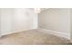 Spacious bedroom with neutral walls and carpet flooring at 2125 Southend Dr # 349, Charlotte, NC 28203