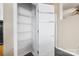 White pantry with wire shelving at 2125 Southend Dr # 349, Charlotte, NC 28203