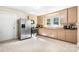 Well-lit kitchen with stainless steel appliances, ample counter space, and updated cabinets at 2401 Boy Scout Rd, Lincolnton, NC 28092