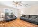 Bright living room with hardwood floors, offering comfortable seating and a welcoming atmosphere at 2401 Boy Scout Rd, Lincolnton, NC 28092