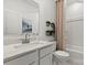 Clean bathroom featuring an undermount sink, shower with plants and modern fixtures at 2561 Blue Sky Meadows Dr, Monroe, NC 28110