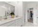 Modern bathroom featuring double sinks, quartz countertops, and a walk-in shower at 2561 Blue Sky Meadows Dr, Monroe, NC 28110