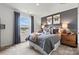 Cozy bedroom featuring sports-themed decor, soft lighting, and a comfortable bed, perfect for relaxation at 2561 Blue Sky Meadows Dr, Monroe, NC 28110