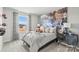 Stylish bedroom featuring a football theme, window and a cozy bed at 2565 Blue Sky Meadows Dr, Monroe, NC 28110