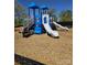 Community playground with multiple slides, climbing structures, ladders, and seating at 2565 Blue Sky Meadows Dr, Monroe, NC 28110