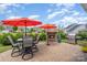 Charming backyard with patio, outdoor fireplace and stainless steel barbecue grill at 3029 Quinebaug Rd, Fort Mill, SC 29715