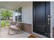 Inviting front porch featuring rocking chairs and a view of the well-manicured front yard at 3029 Quinebaug Rd, Fort Mill, SC 29715