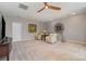 Upstairs living area with neutral walls, comfy seating, and lots of room to relax at 3029 Quinebaug Rd, Fort Mill, SC 29715