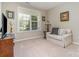Cozy living room bathed in natural light, showcasing a comfortable couch and tasteful decor at 3029 Quinebaug Rd, Fort Mill, SC 29715