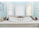 Relaxing bathroom with corner jacuzzi tub at 4815 Sugar And Wine Rd, Monroe, NC 28110