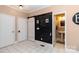 Charming bathroom with a chalkboard accent wall and a barn door at 4815 Sugar And Wine Rd, Monroe, NC 28110